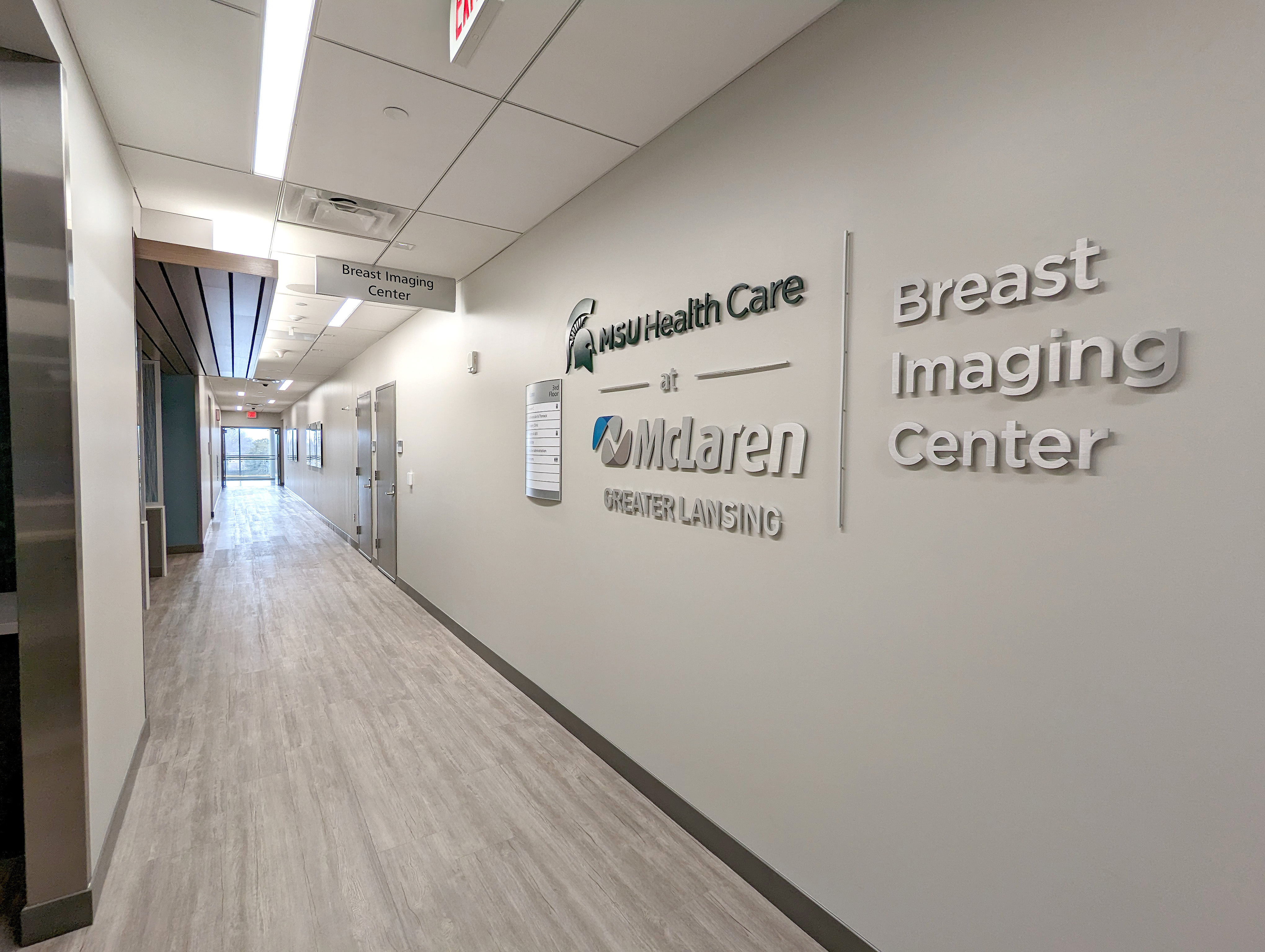 Image of the lobby and logo of the MSU Health Care at McLaren Greater Lansing Breast Imaging Center